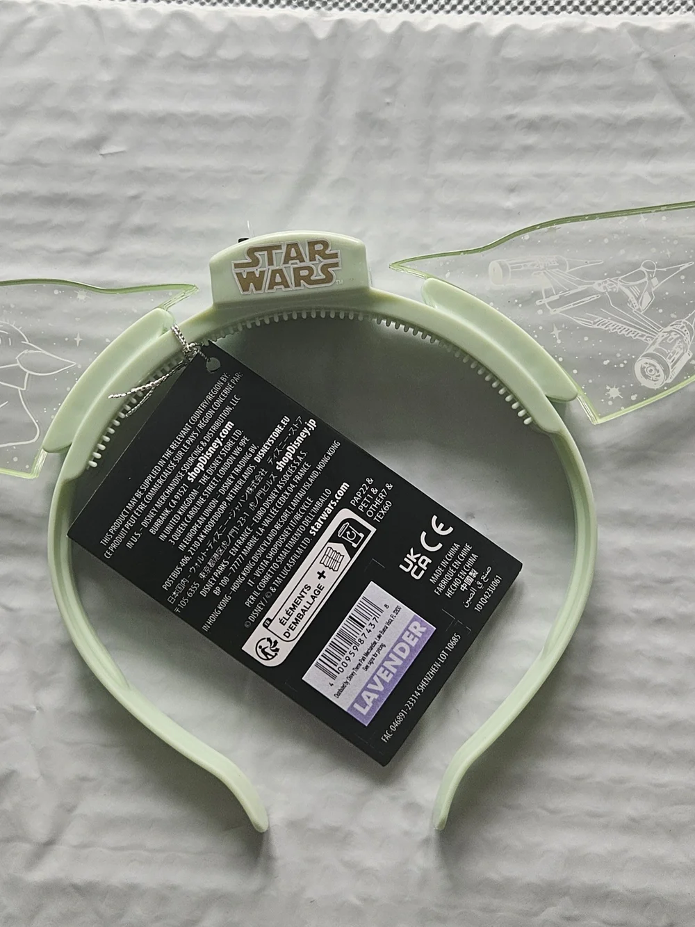 Disney Parks Star Wars Grogu ears headband feature translucent light-up ears.
